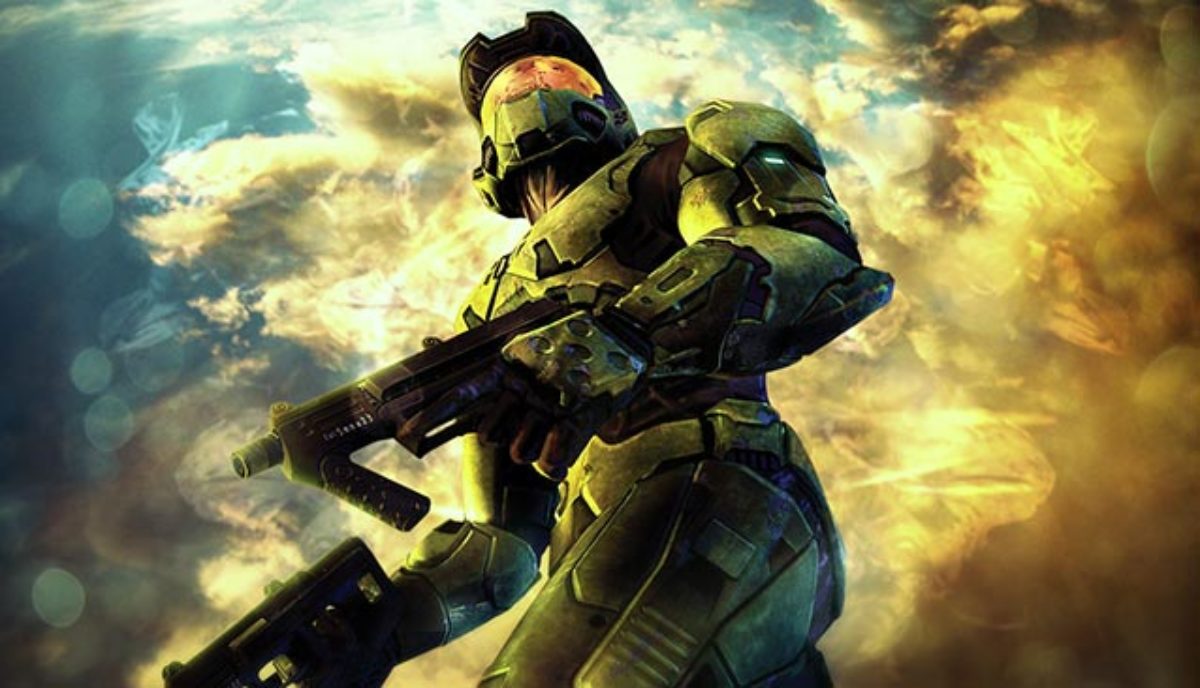 Master Chief holding dual-wielding SMGs and looking out above the camera.