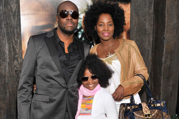 Wyclef Jean, his wife, and a daughter