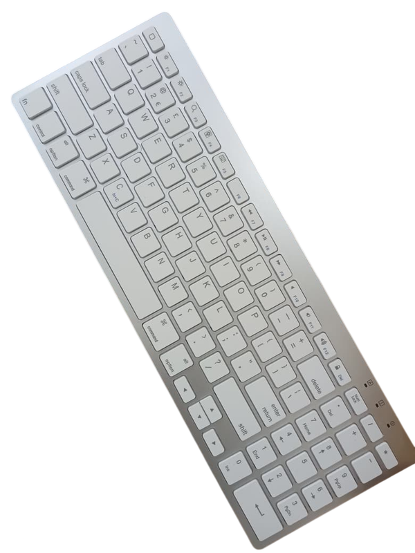 Wireless keyboard setup on desk with laptop and mouse, perfect for work and study in Pakistan