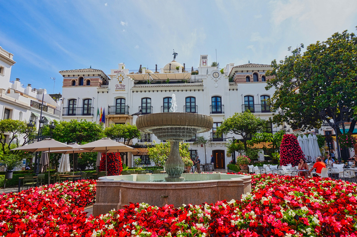 Estepona old town with white streets and flowers