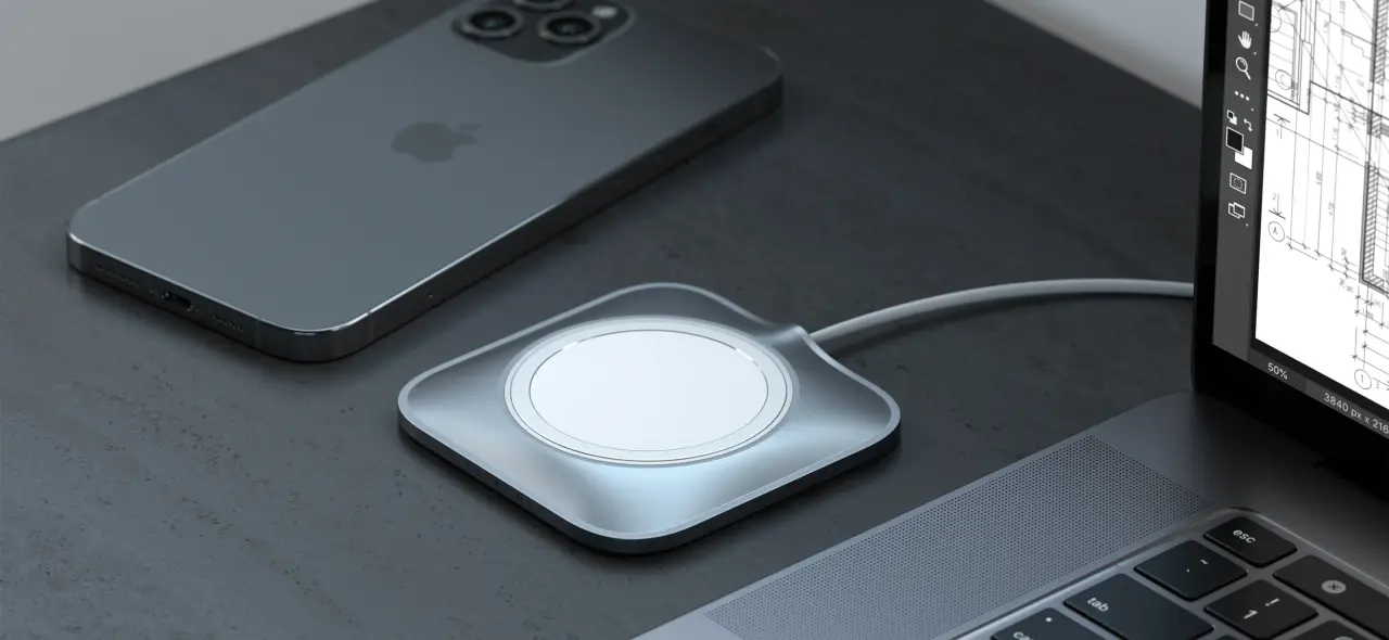 Soporte Satechi de aluminio con un cargador MagSafe y un iPhone.