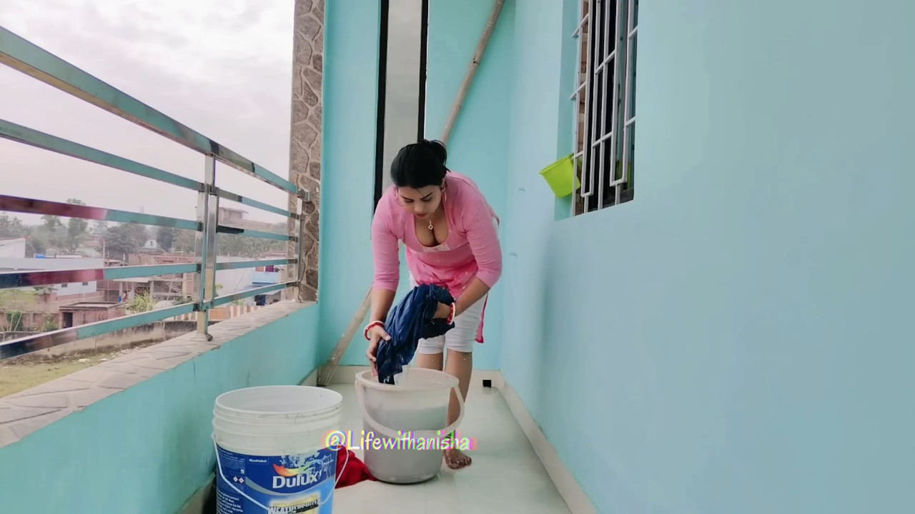 Desi busty girl huge boobs and cleavage show while cleaning in pink dress  mp4 snapshot 06 29 630  Postimages