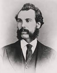 Alexander Graham Bell Alexander Graham Bell segurando telefone antigo
