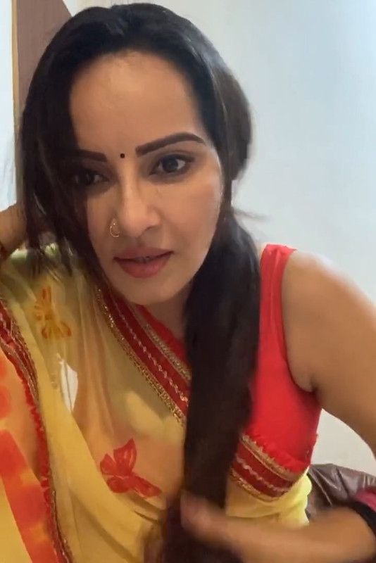 Geetanjali Mishra Sexy Cleavage and armpit though in Orange sleevless saree.mp4_snapshot_06.17.898