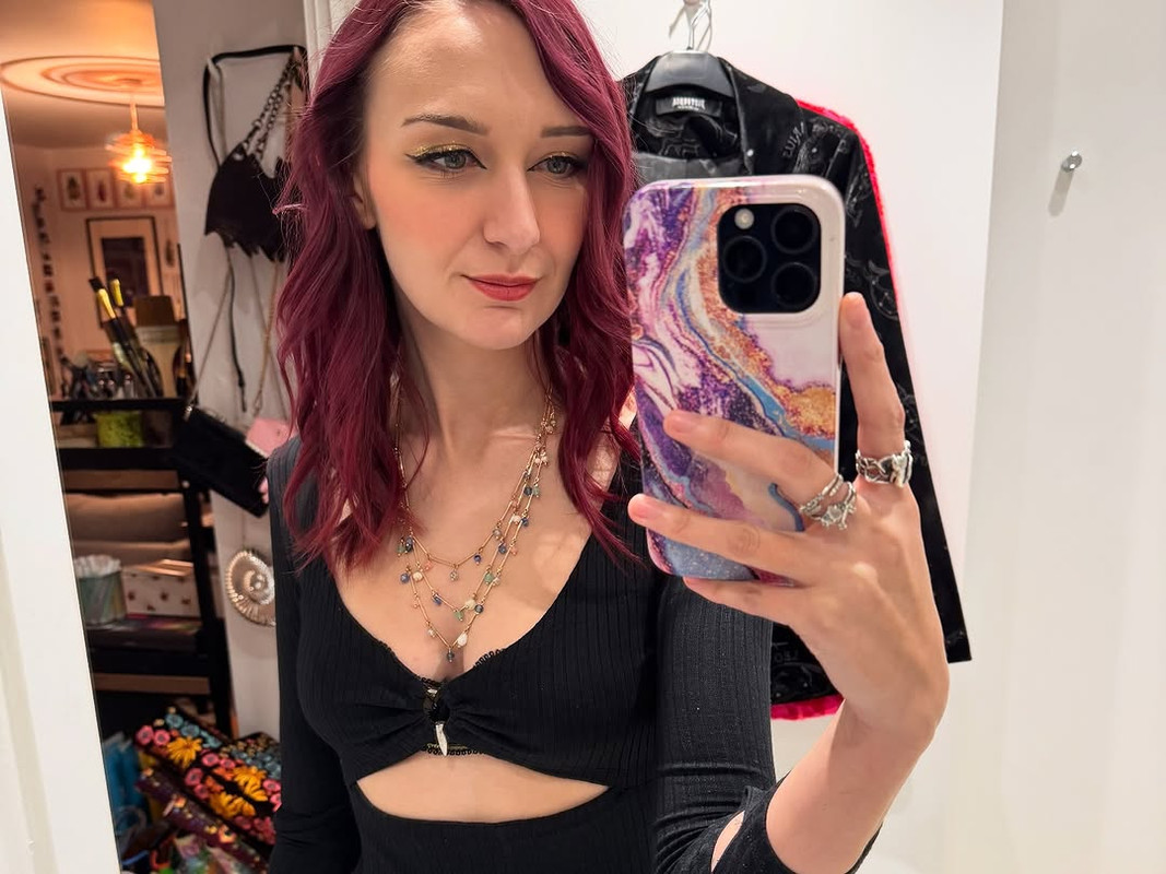 Rachel Oates black dress cleavage 2