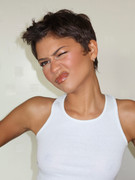 Zendaya-Braless-White-Top-Paris395