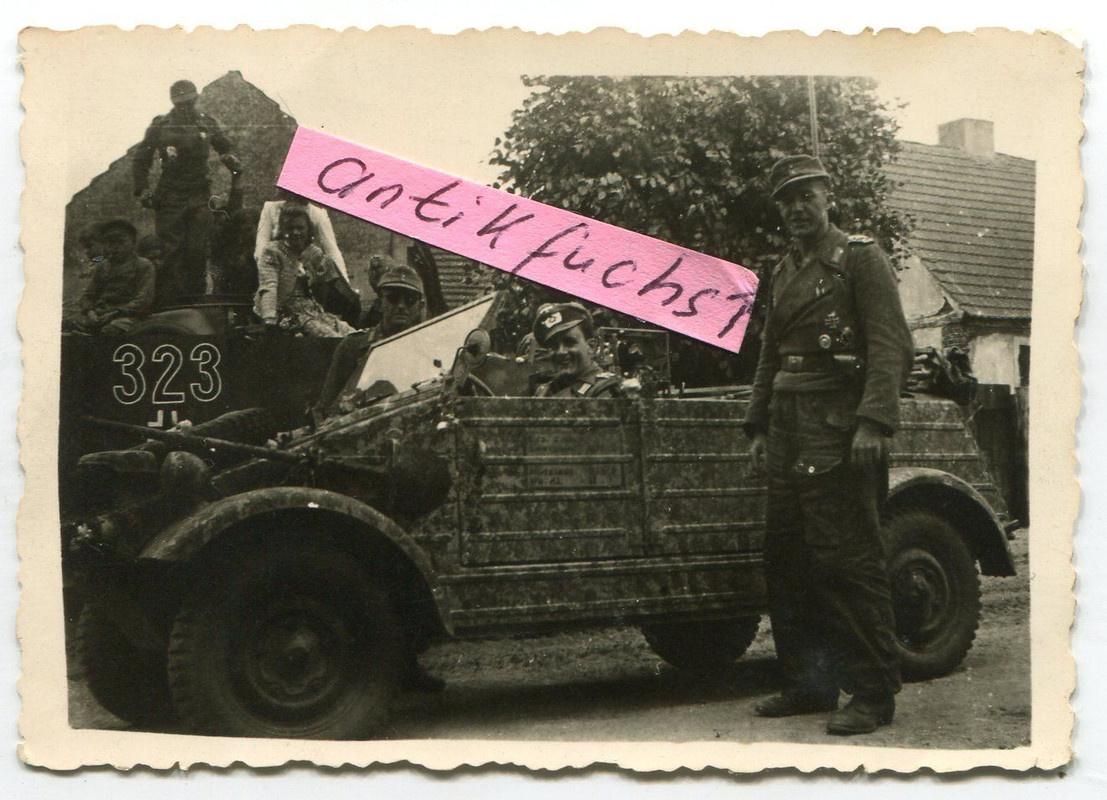 VW-Kübelwagen mit Karl Buckel und Panzer-Sturmgeschütz in Paplit