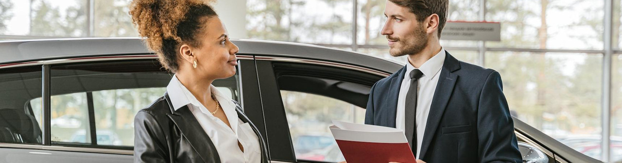 A businesswoman having conversation with a salesman