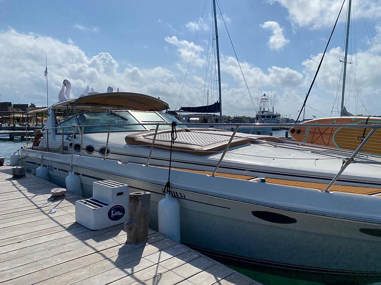 Tata 43 ft yacht charter Cancun - Interior view showing luxury amenities and comfortable seating for 15 guests