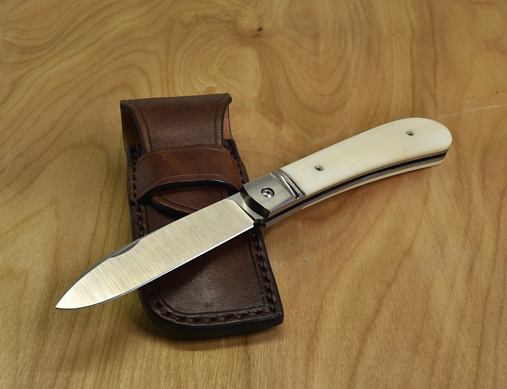 trivisa-bone-m390-1.jpg
