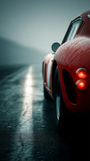 Classic_Ferrari_red_curves_reflecting_in_wet_asph_781212aa-bbe1-4b98-bcf6-9d97e43b41aa
