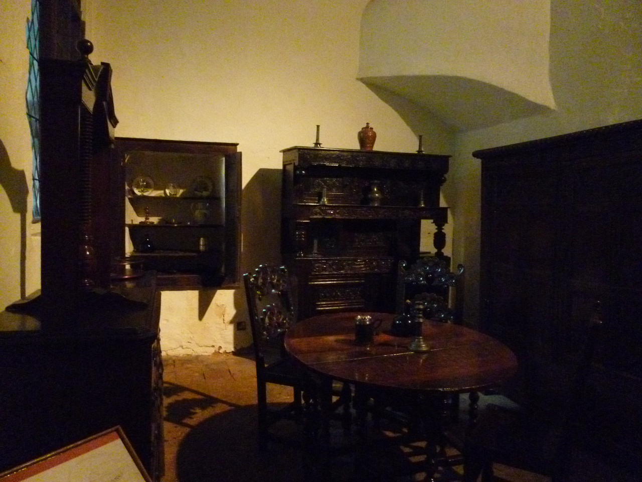 Photo of the Jacobean furniture in one room of Aston Hall.  It's all very dark wood and heavy.