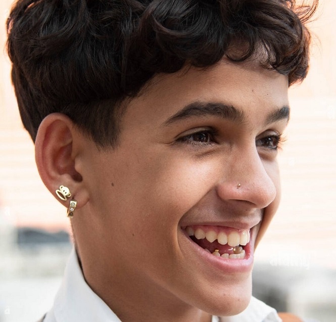 young-cuban-boy-laughs-at-friends-reveal