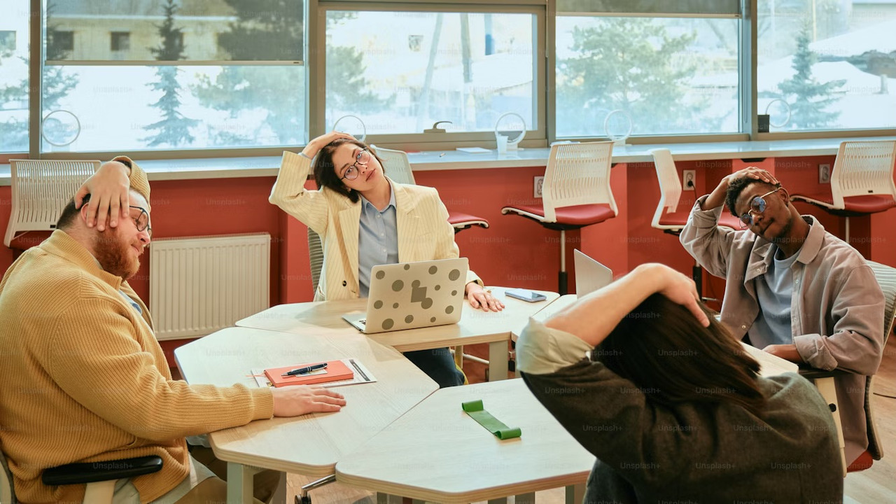 Office worker doing desk exercises at workplace