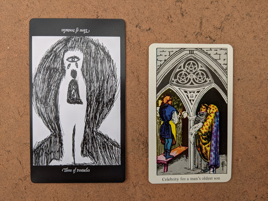 The Three of Pentacles from the Elsewhere Tarot, showing a rough, sketchy drawing of an armless three-eyed monster with nested robed figures in its chest, alongside the Two of Pentacles from a janky, bootleg RWS deck, showing a builder or mason taking direction from two robed ecclesiastical figures who presumably employed him for the job.