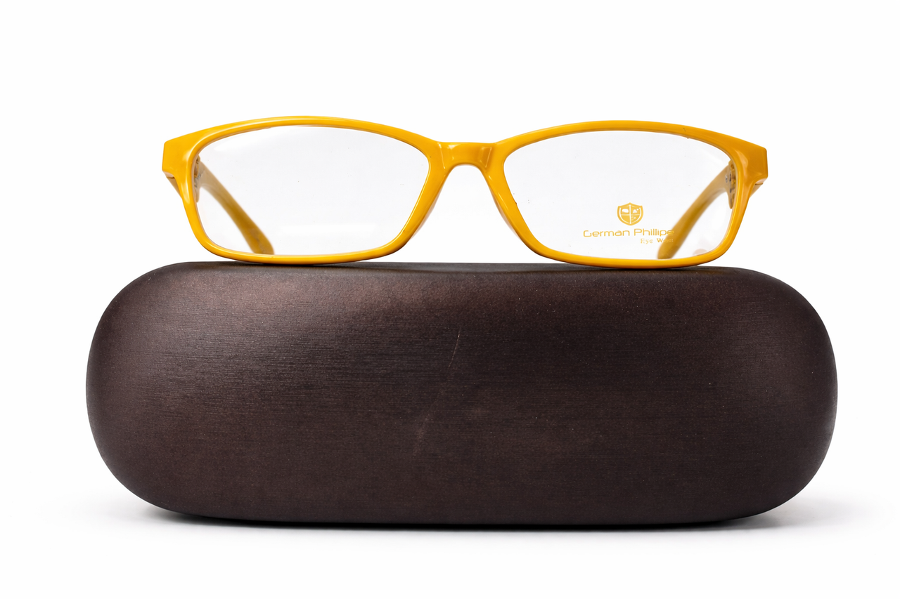 Yellow eyeglasses on brown case