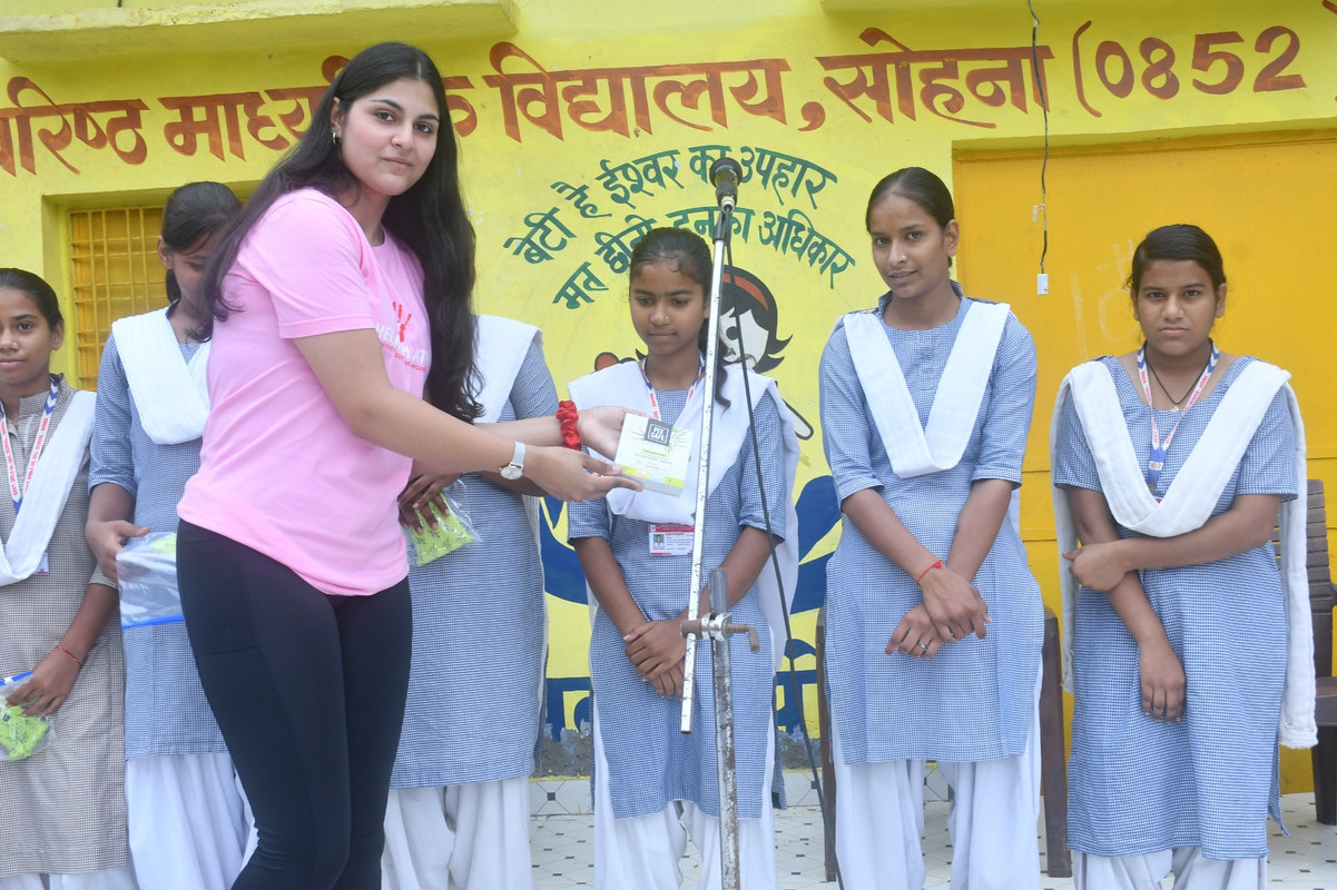 Volunteers at a sign-in table