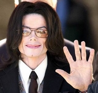 michael-jackson-waving-wearing-glasses-1218632823-crop-320x306.jpg