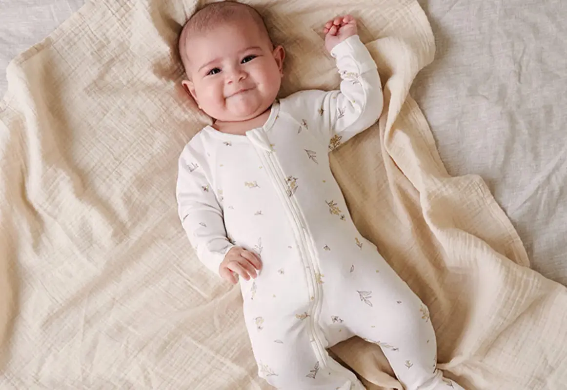 What are some general tips for clothing your baby for sleep