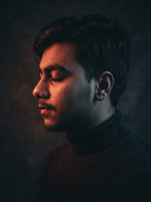 AI-generated example result for the creative-images prompt: Moody Split Lighting Profile by Prompt Craft
