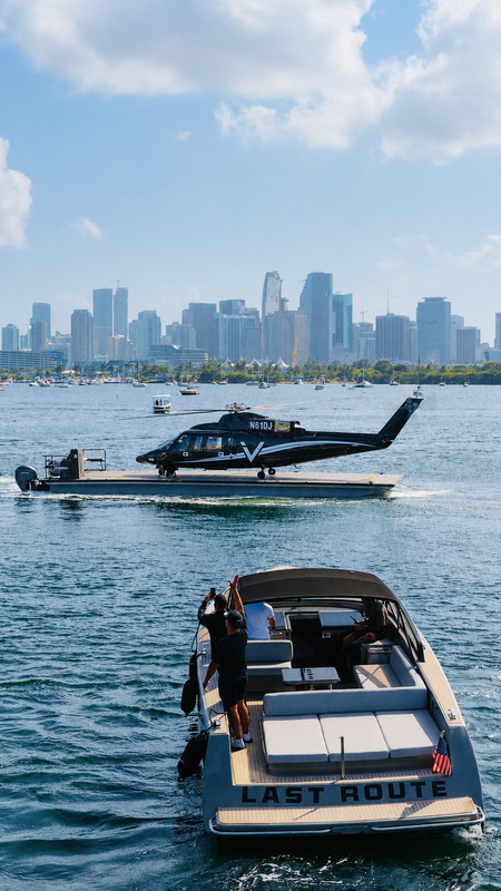 Private helicopter arrival on a water helipad near Miami waterfront