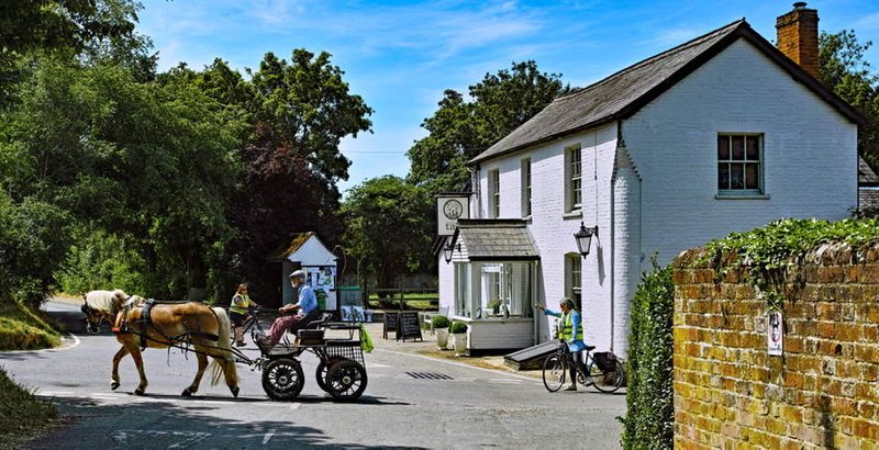 People-horse-cart-village-centre.jpg