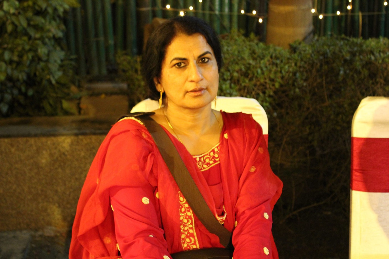 Nisha Ahmad, school principal with science teaching experience, as identified in the supplied report