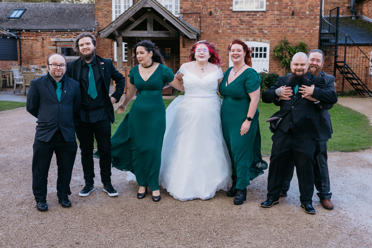 Family photo in wedding attire
