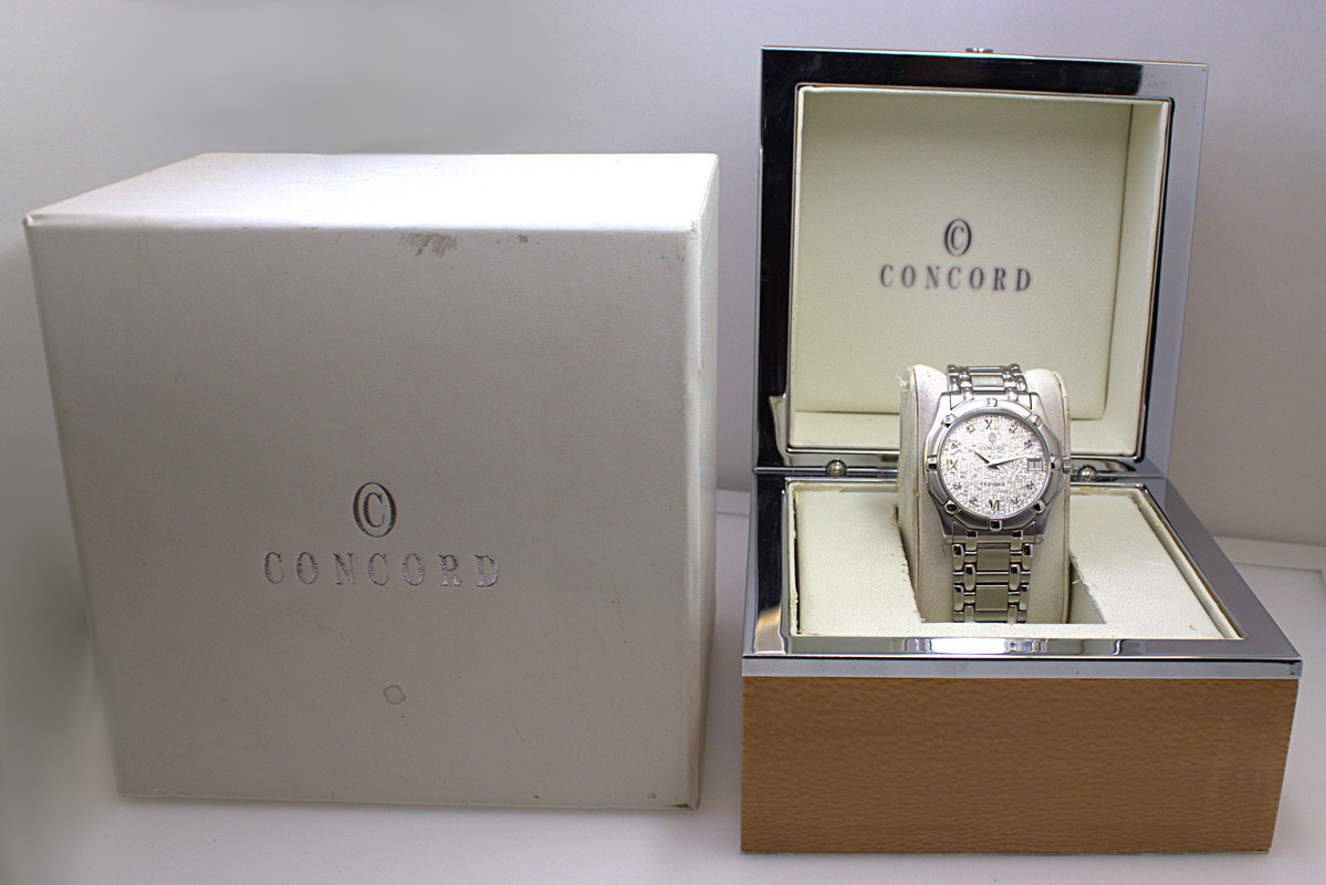 Montre Concord Saratoga Homme – Acier Inoxydable, Affichage Date, Mouvement Quartz – Occasion