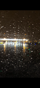2704 - view thru window of car or plane of runway at night raini
