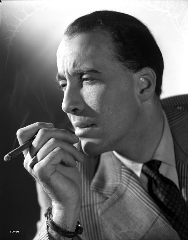 Christopher Lee smoking a cigarette (or weed)
