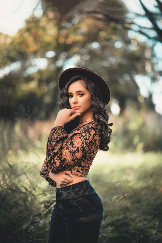 woman-in-floral-long-sleeve-shirt-2640743