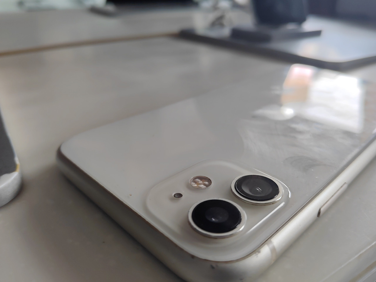 Focused buyer examining contract or features before purchase