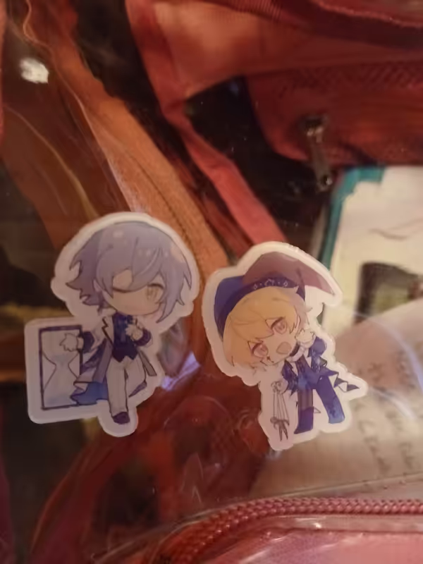 Small pins of Rui Kamishiro and Tsukasa Tenma from Project SEKAI 