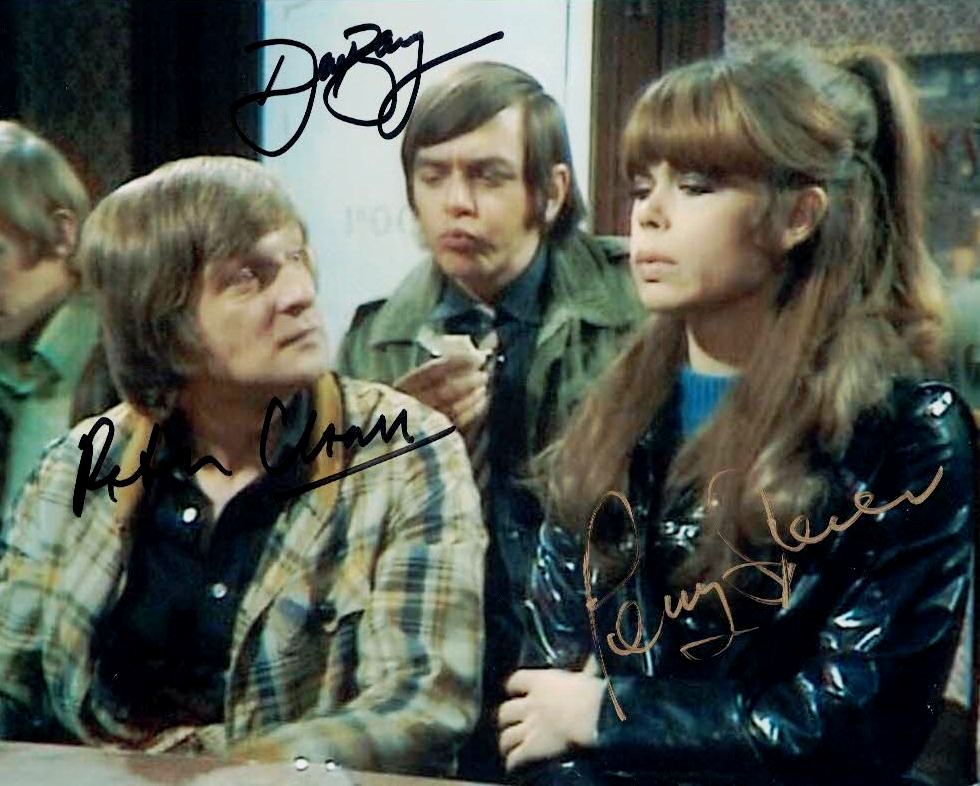 pennyspencer('please-sir')wearingashinyblackpvcmac(1).