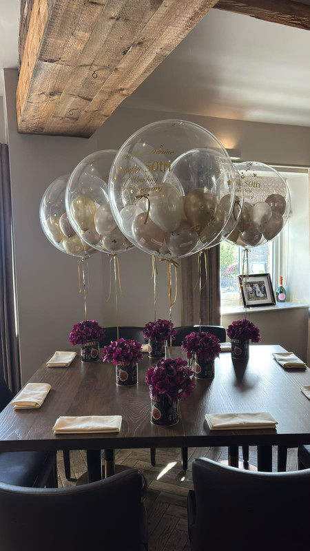 Table balloons for an event.