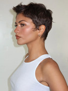 Zendaya-Braless-White-Top-Paris394