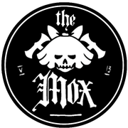 circular badge with Mox logo