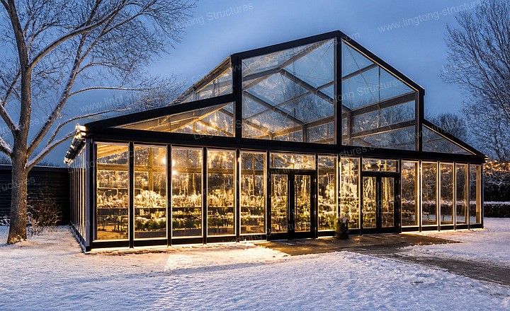 Atrium banquet tent interior with natural daylight, wood flooring and chandeliers for a wedding reception