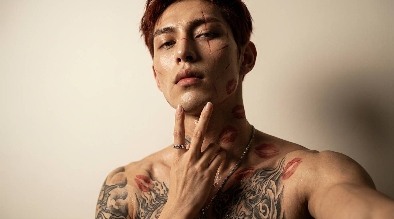 Woman touching shirtless mans chin 202608171800