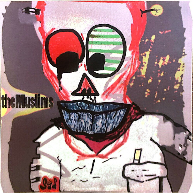 a sticker with an odd piece of art-- a humanoid figure with one red eye, one green and white striped eye, a red triangle nose, big black-blue lips, a light red head, a white t-shirt with a cigarette in the breast pocket, and a brown background. it also seems to have little antennae, and says 'the muslims' on the left side of it.