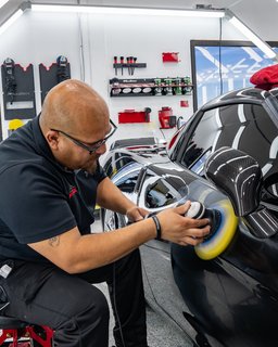 Gtechniq Crystal Serum Ultra applied to a vehicle during professional ceramic coating service