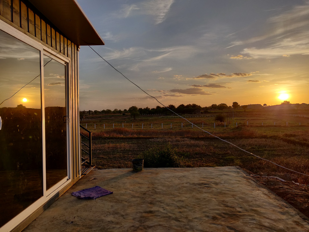 Inside a modern polyhouse with lush hydroponic crops