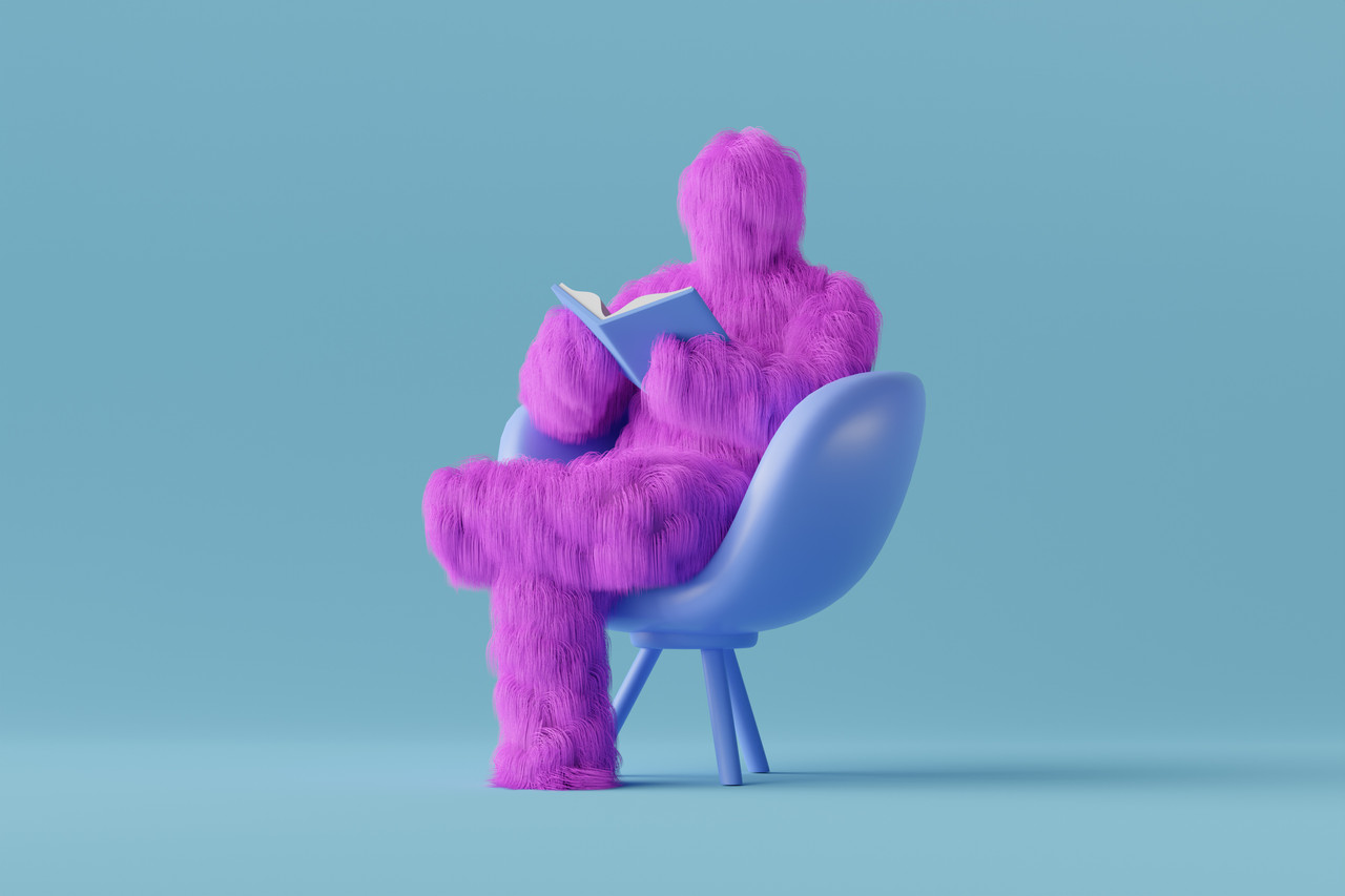 purple yeti cartoon sitting chair