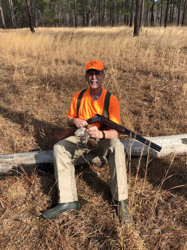Bird-Hunt-2-23-23-Bruce-with-Bobwhite.jpg