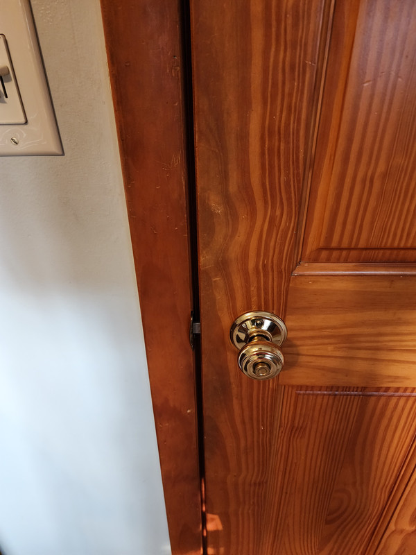 Bedroom door latch and strikeplate too far apart to keep closed (but