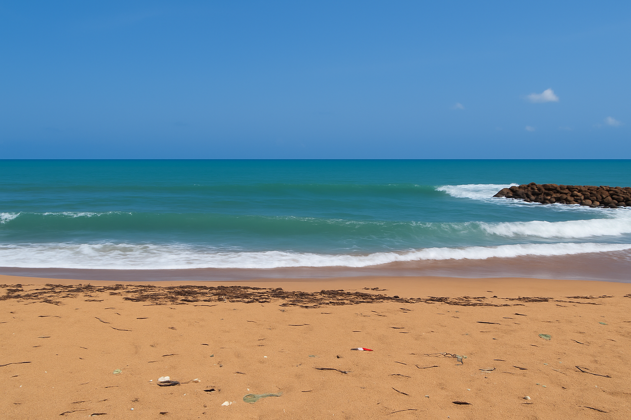 Ada beachfront property level terrain with sand and sea access