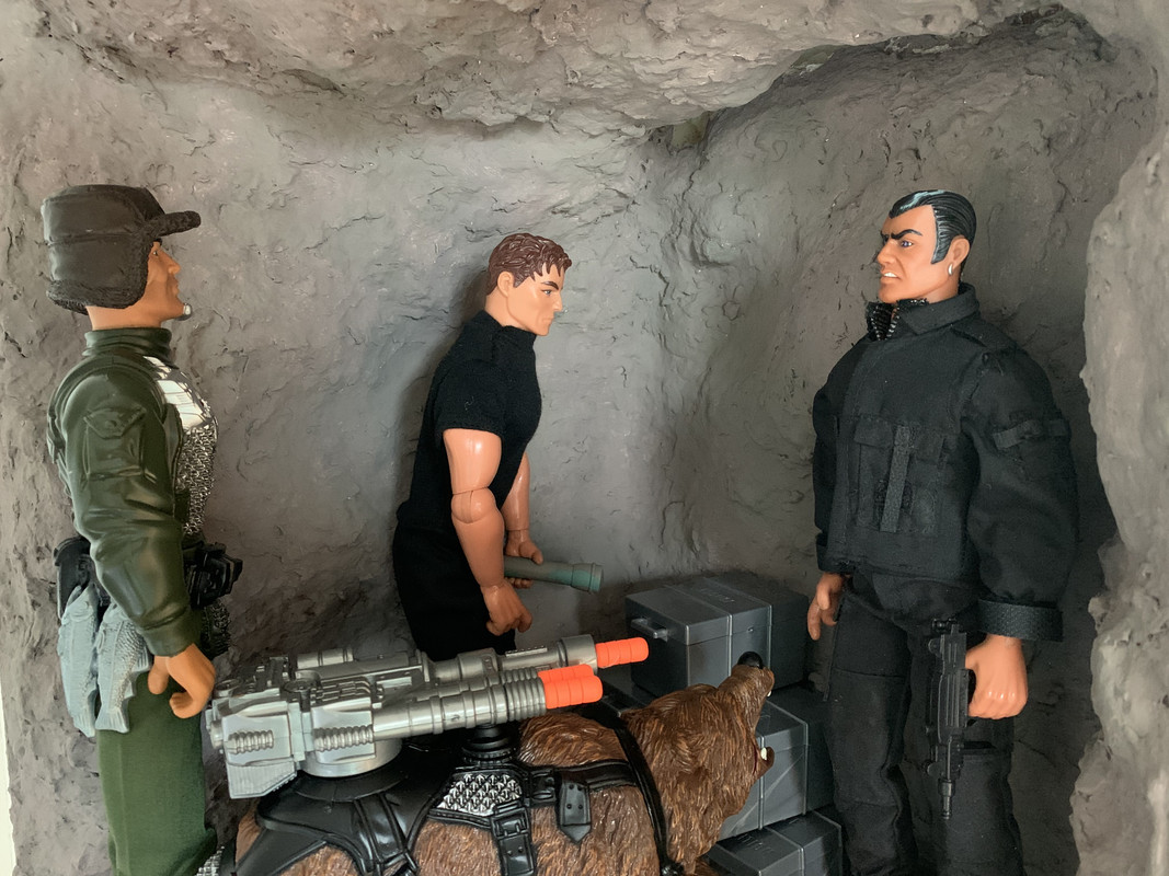 Smugglers caught checking their stolen loot by Action Man and his grizzly bear. 904-F3-F5-E-0460-49-A2-BC84-B93-F4-BD2-AA70