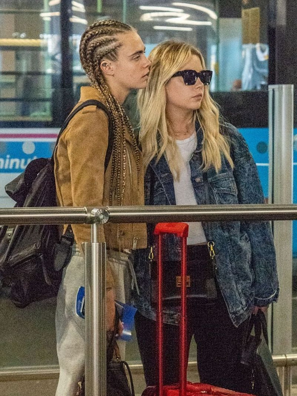 cara-delevingne-and-ashley-benson-at-heathrow-airport-in-london-