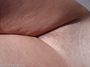 Erotic_Anarchy_Beach_Blowjob_02_Closeup_of_my_wet_pussy_on_a_public_nude_beach_